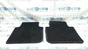 A set of black rubber floor mats for a 7-seater VW Tiguan 20-24.
