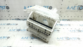 The bare heater housing of a Toyota Rav4 19-25 hybrid with ventilation, white housing