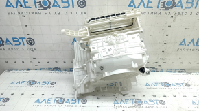 The bare heater housing of a Toyota Rav4 19-25 hybrid with ventilation, white housing