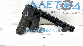 Subaru Forester 25-26 front bumper mount, left fender