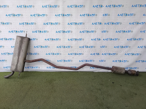 Single-pipe exhaust system for a Ford Fusion mk5 19-20 2.0 hybrid, plug-in with catalytic converter, rusty, studs sawed off
