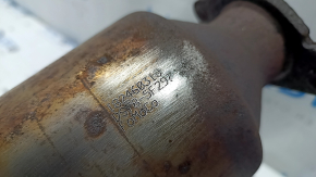 Single-pipe exhaust system for a Ford Fusion mk5 19-20 2.0 hybrid, plug-in with catalytic converter, rusty, studs sawed off