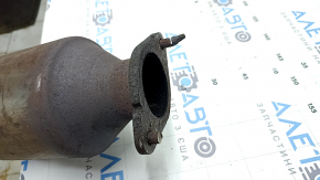 Single-pipe exhaust system for a Ford Fusion mk5 19-20 2.0 hybrid, plug-in with catalytic converter, rusty, studs sawed off