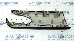 Subaru Forester 25-26 right front panel trim, black with blue stitching