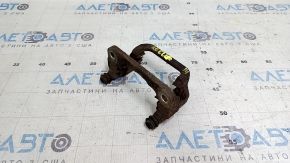 Rusty rear right caliper bracket for a 1920 Nissan Rogue