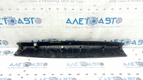 Upper trim of the trunk door of Subaru Forester 25-26 black, dented,