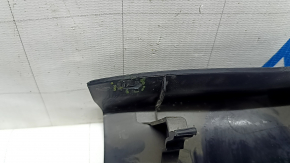 Upper trim of the trunk door of Subaru Forester 25-26 black, dented,
