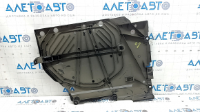 The right fuel tank guard for a Subaru Forester 25-26 is dented and torn.