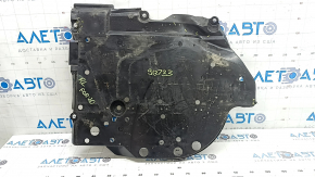The left fuel tank guard for a Subaru Forester 25-26 is dented and torn.