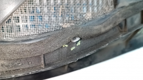 The plastic windshield wiper grille for a Lexus GS300 GS350 GS430 GS450h from 2006-2011 has a broken mount.