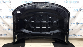 The hood of a Ford Explorer 20-25 is bare, black, UM, and has chips and glue on it.