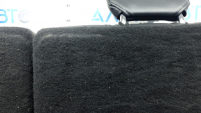 The back of the rear row of seats, row 3, Ford Explorer 20-25, black leather, with headrests, scuffs