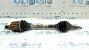 The front left half shaft of a Ford Explorer 20-25 AWD is rusty, and the outer CV joint boot is torn.