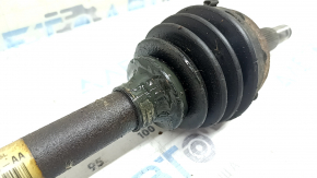 The front left half shaft of a Ford Explorer 20-25 AWD is rusty, and the outer CV joint boot is torn.