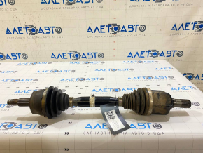 The front right drive axle shaft of a Jeep Renegade 15-21 2.4 AWD has a torn boot.