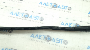 The front bumper absorber of the Audi A5 F5 18-19 has a broken mount and is dented.