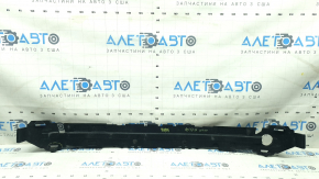 The front bumper absorber of the Audi A5 F5 18-19 has a broken mount and is dented.