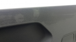 Right arch trim for a VW Tiguan 18-24, black, 2 rows, scratches, dents