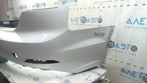 Bare rear bumper for an Audi A5 F5 20-25 S-Line without parking sensors, white, without a plug, scratches, worn, broken mount