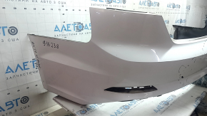 Bare rear bumper for an Audi A5 F5 20-25 S-Line without parking sensors, white, without a plug, scratches, worn, broken mount