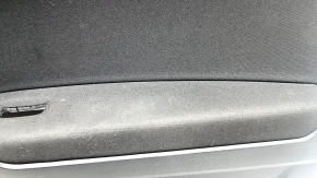 Black front right door panel for a VW Tiguan 18-20, with a buzzer, black fabric armrest, fabric insert, black chrome insert, with a handle, scratches, peeling handle cover, needs cleaning, dent