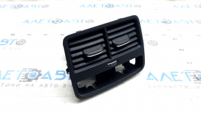 The center console air vent for the Audi A5 F5 18-25 is black and has a broken guide.