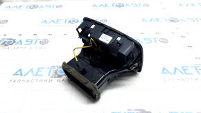 The center console air vent for the Audi A5 F5 18-25 is black and has a broken guide.