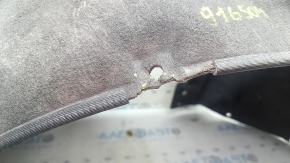 The front right rear fender liner of the Audi A5 F5 18-25 has a torn mount.