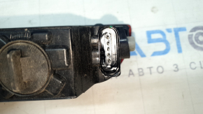 The left rear bumper light of the Audi Q7 16-26 is worn.
