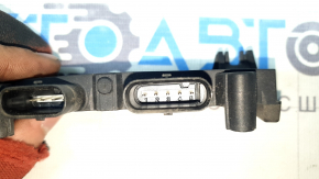 The foot-operated trunk lid opening sensor assembly for the Audi Q7 16-26 has a broken mount.