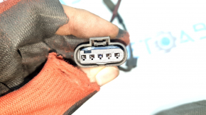 The foot-operated trunk lid opening sensor assembly for the Audi Q7 16-26 has a broken mount.