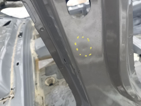 The central right body pillar of a Subaru Forester 25-26 on the body, a butt