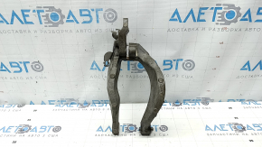 The front left shock absorber fork of a Volvo XC90 16-18 AWD has a broken bolt.