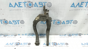 The front left shock absorber fork of a Volvo XC90 16-18 AWD has a broken bolt.