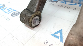 The front left shock absorber fork of a Volvo XC90 16-18 AWD has a broken bolt.