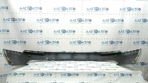 The bare lower rear bumper of a Volvo XC90 16-23, for parking sensors, white, scratches