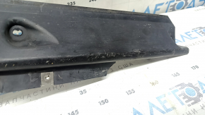 Left door sill protection for Audi Q7 16-26 is worn and cracked.