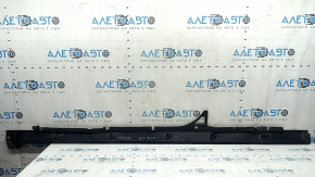 Left door sill protection for Audi Q7 16-26 is worn and cracked.