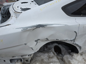 Rear right quarter wing of a Ford Mustang mk6 15-23 coupe, on the body, white, dents