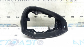 The right mirror housing of the Audi A5 F5 18-25 is dented.