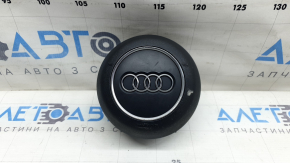 The Audi A4 B9 17-25 gray steering wheel airbag has a broken mount.