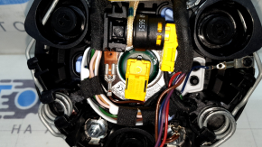 The Audi A4 B9 17-25 gray steering wheel airbag has a broken mount.