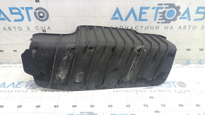 The lower control arm lining under the rear left spring is dented for an Audi A4 B9 17-25.