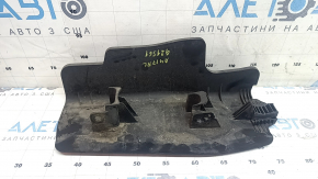 The lower control arm lining under the rear left spring is dented for an Audi A4 B9 17-25.