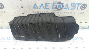 The lower control arm pad under the rear right spring is dented for the Audi A4 B9 17-25.