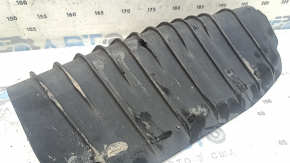 The lower control arm pad under the rear right spring is dented for the Audi A4 B9 17-25.