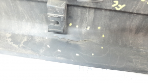 The lower front left door trim for a Lincoln Corsair 20-26 is dented and torn.