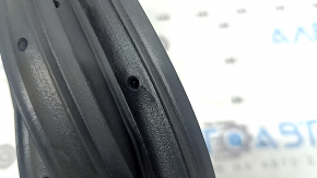 The front right door seal of the Lincoln Corsair 20-26 is torn.