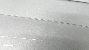 Lincoln Corsair 20-26 black center console trim, right side, black leather insert with gray stitching, scratches, tear