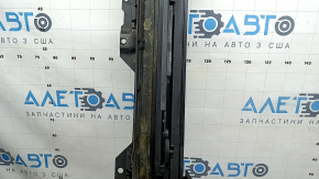 The hatch mechanism of the BMW 3 G20 19-26 frame is covered in soot and melted.